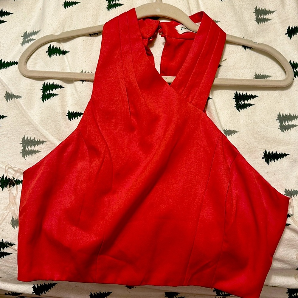 Medium red crop top with tags from the pants store